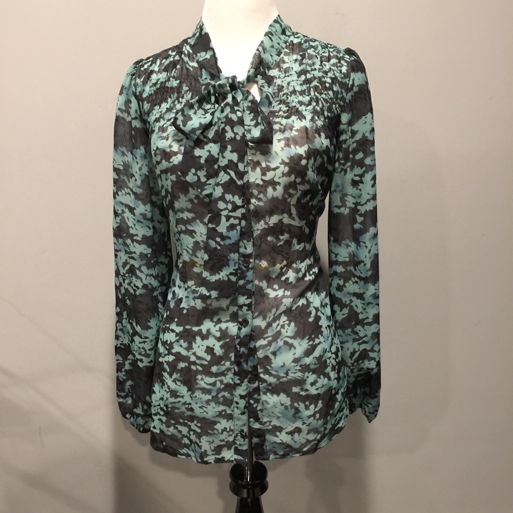 A blue and black patterned Blouse